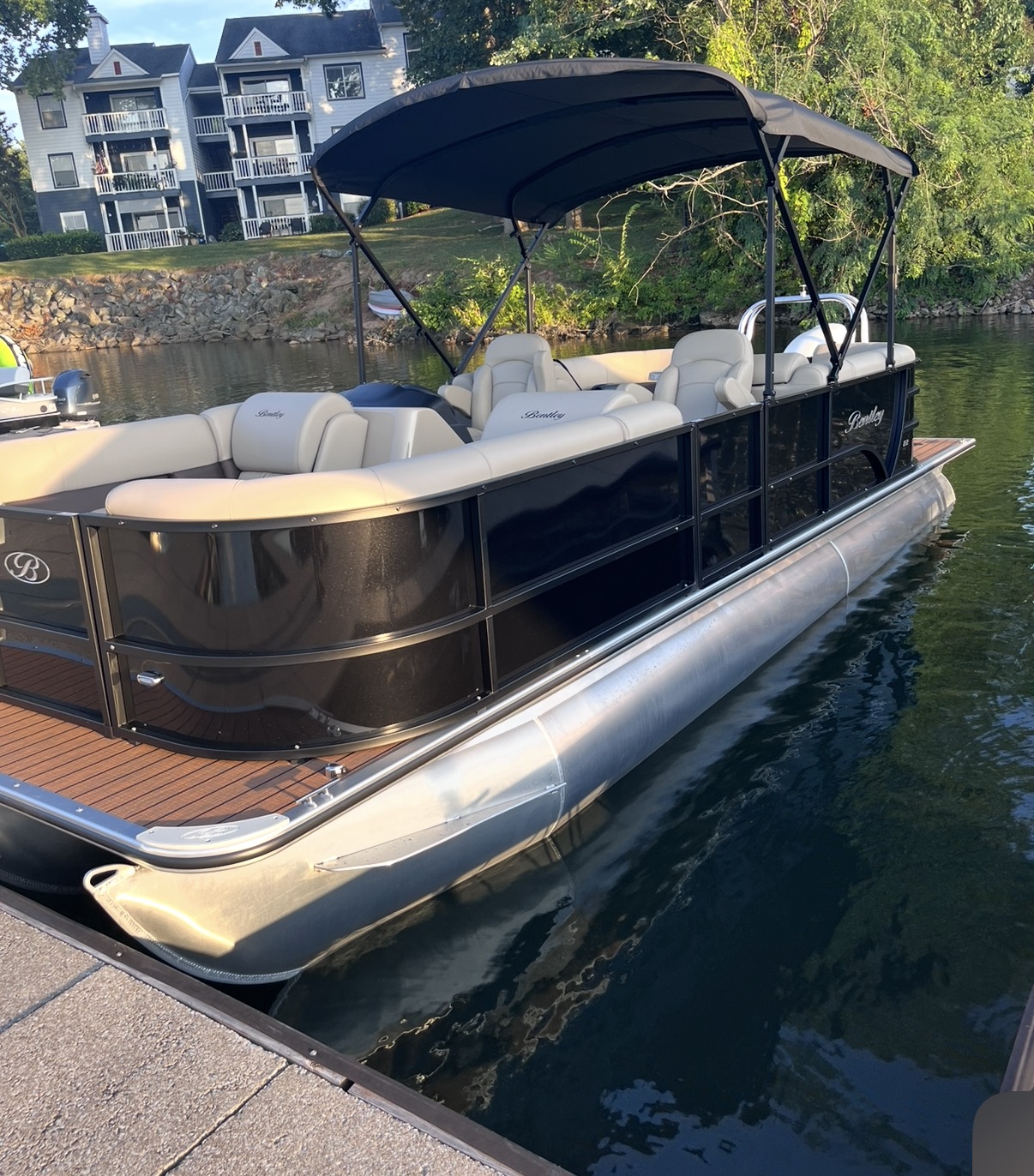 The 2025 Bentley tritoon docked on Lake Norman